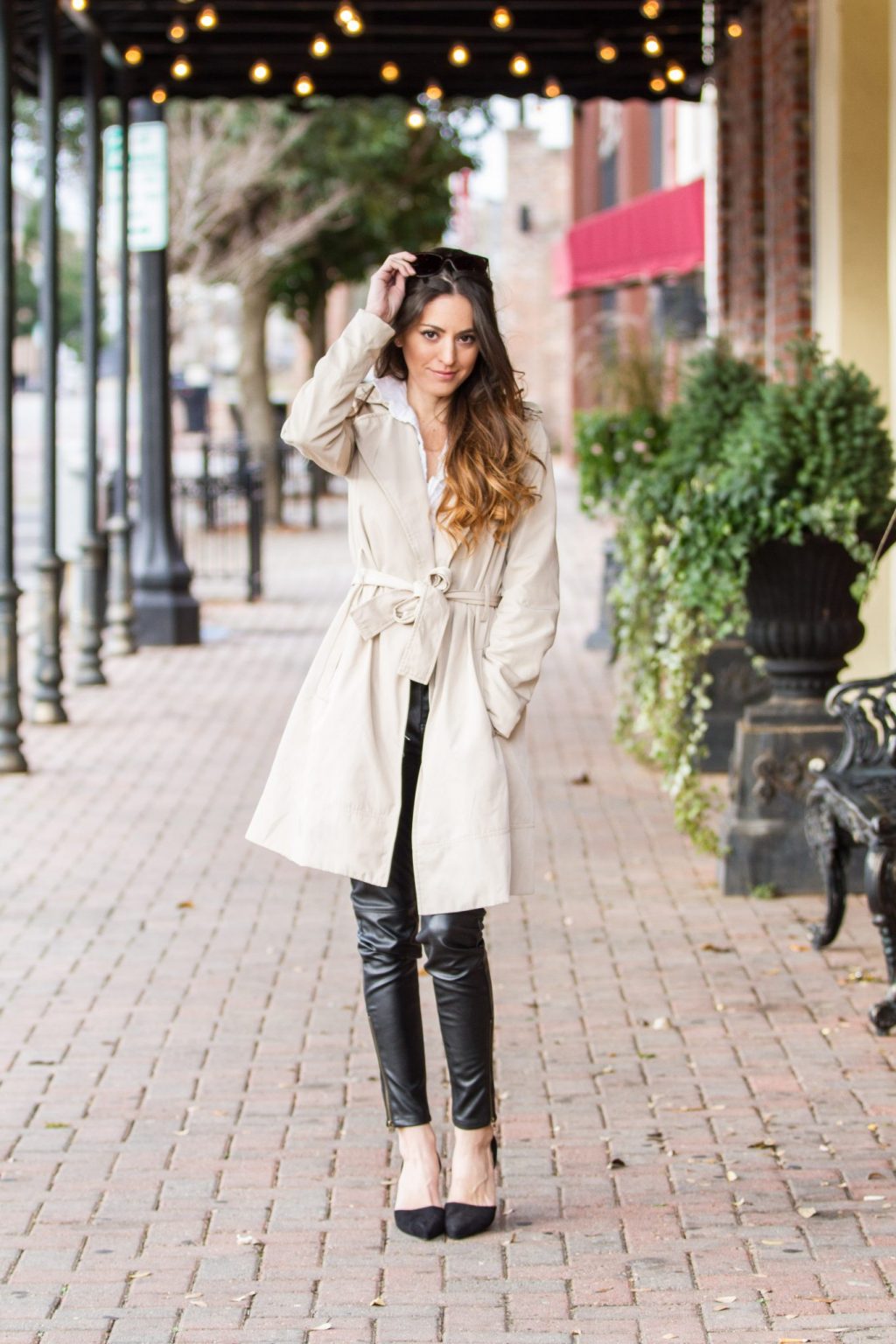 winter Wardrobe Staples, women's white button down, black faux leather pants, black pumps, beige trench coat, khaki trench coat
