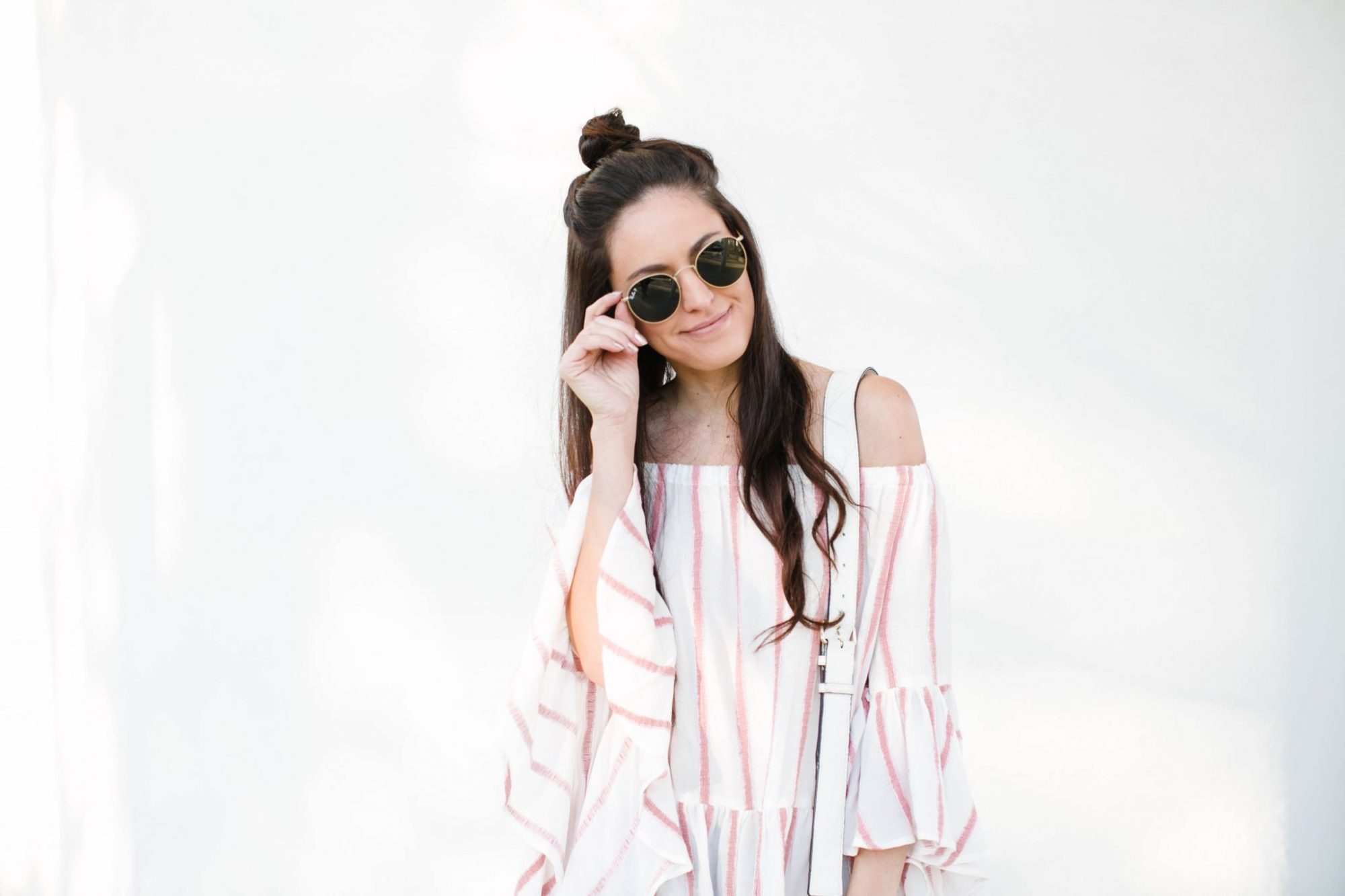 spring style, casual spring style, striped off the shoulder top, how to style an off the shoulder top, summer style, round ray-bans, chinese laundry chandy flats, rebecca minkoff white saddle bag
