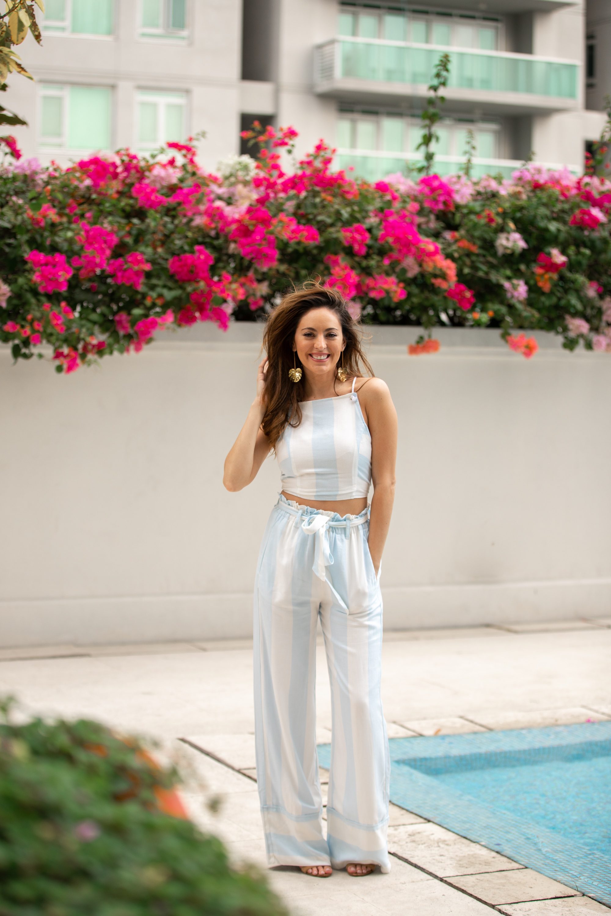 poolside, what to wear on vacation, matching set, blue striped matching set, palazzo pants, raffles makati, layover in manila, travel in style, summer style, summer outfit ideas, lauren james miami crop top, lauren james cabana hampton palazzo pant