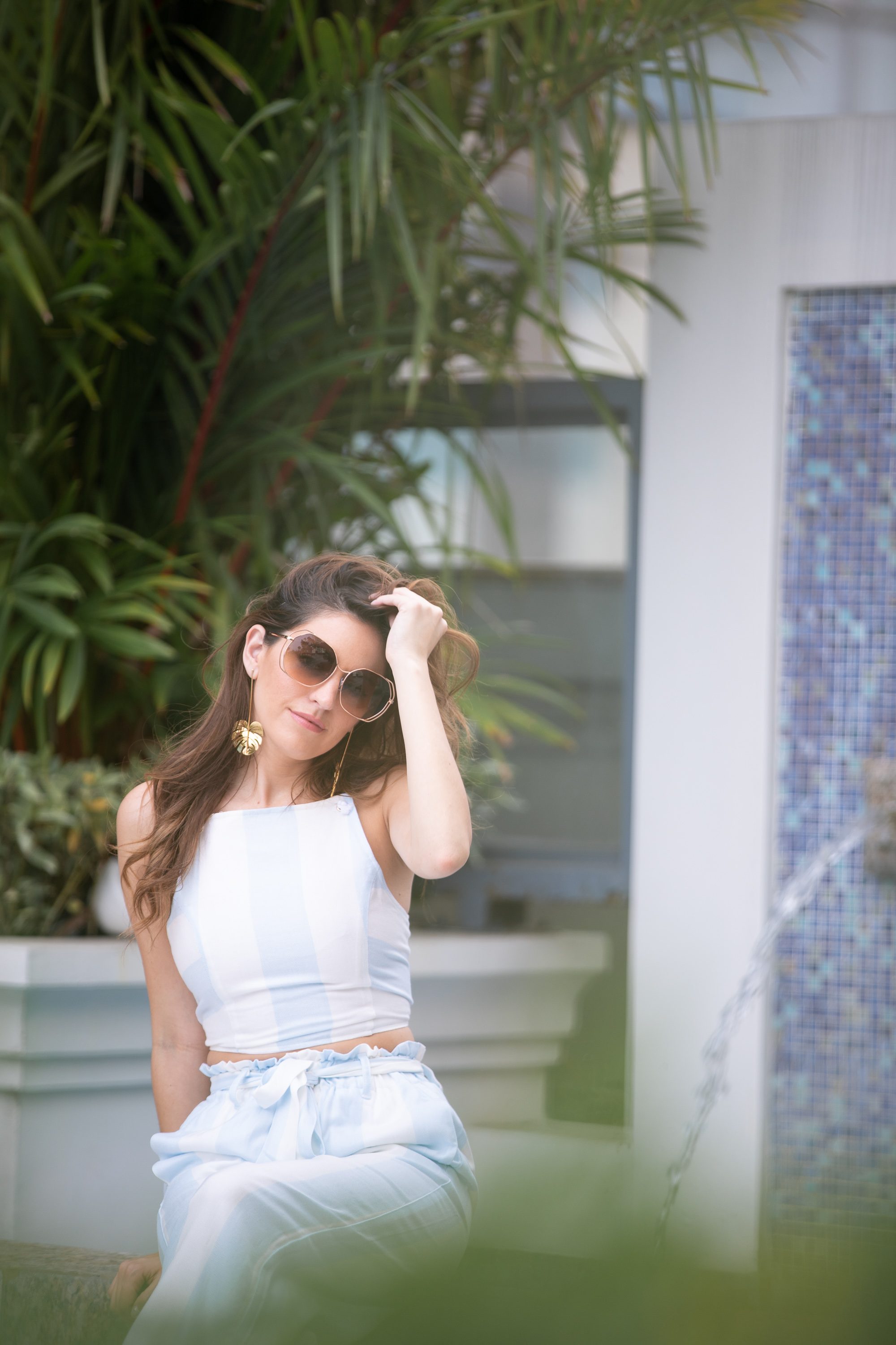 poolside, what to wear on vacation, matching set, blue striped matching set, palazzo pants, raffles makati, layover in manila, travel in style, summer style, summer outfit ideas, lauren james miami crop top, lauren james cabana hampton palazzo pant