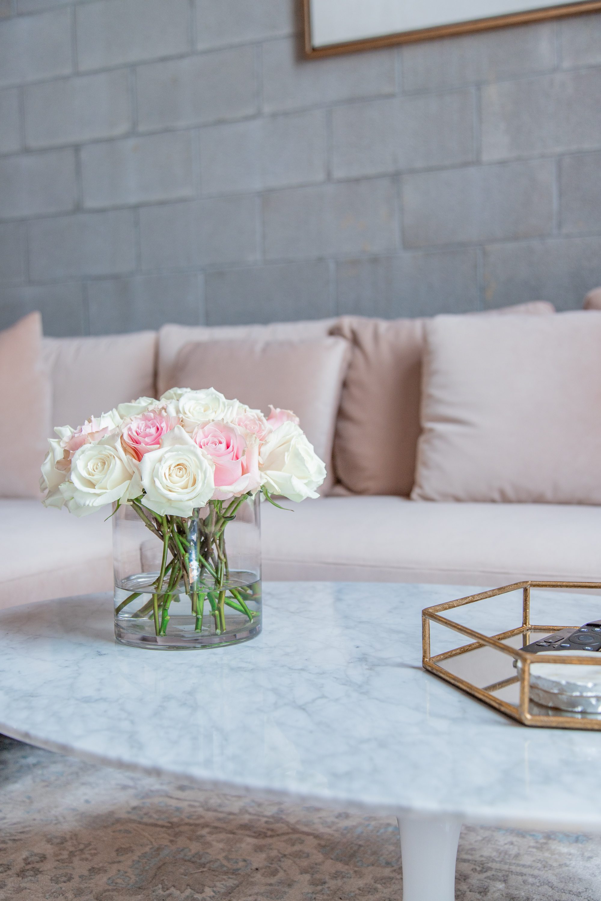 living room makeover, living room reveal, blush pink couch, rove concepts hugo sectional pink, rove concepts luca chairs white, rove concepts marble coffee table, rove concepts petal side table, rove concepts coupon code, rove concepts reviews, feminine living room style, living room before and after