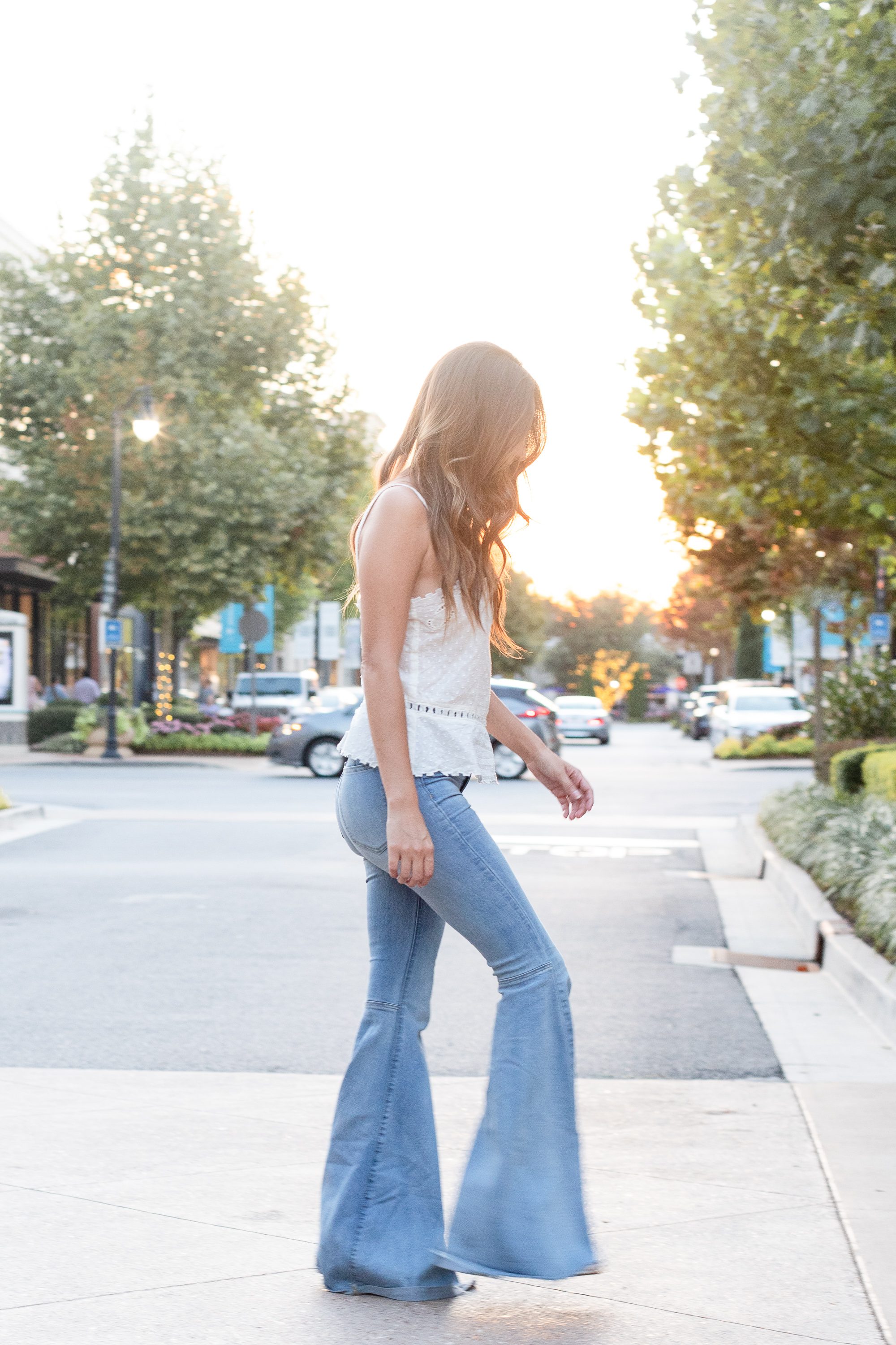 bell bottoms, how to wear bell bottoms in fall, summer to fall transition outfits, flares, large flare jeans, embroidered top
