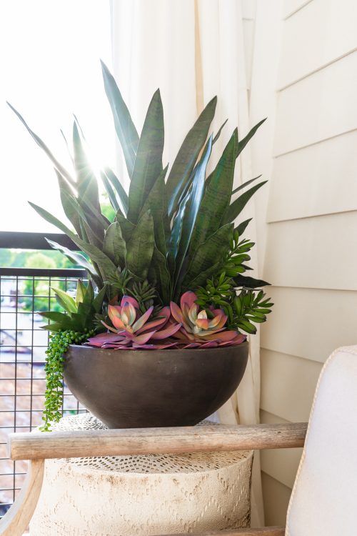 bringing a space to life with faux plants, the perks of faux plants, how to use faux plants in home decor, frontgate faux plants, styled faux plants