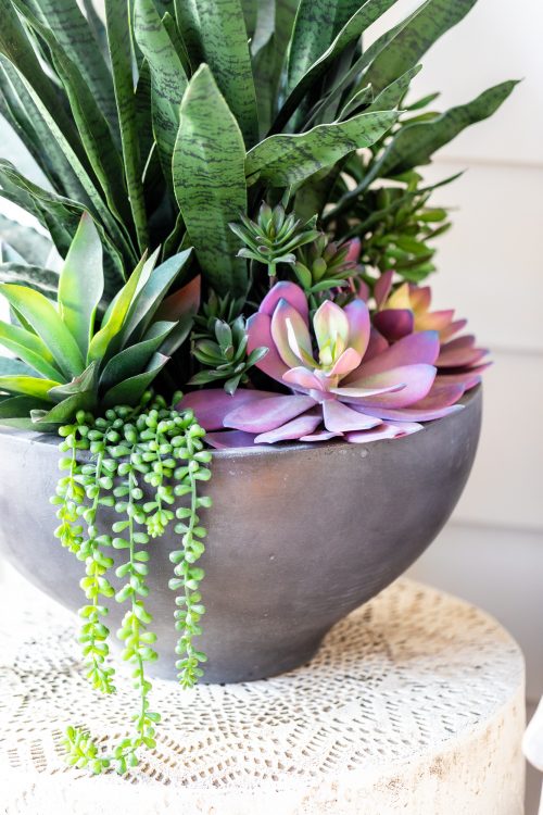 bringing a space to life with faux plants, the perks of faux plants, how to use faux plants in home decor, frontgate faux plants, styled faux plants