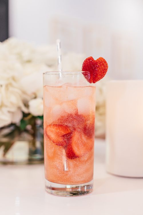 strawberry rosé wine spritzer cocktail recipe, valentine's day cocktail ideas, valentine's day cocktail recipe, rose wine cocktail, edible glitter, pink drink, festive cocktail, themed cocktails, pink cocktail